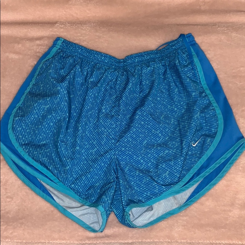 Blue nike running shorts